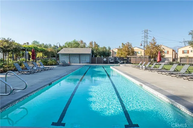 a view of yard with swimming pool