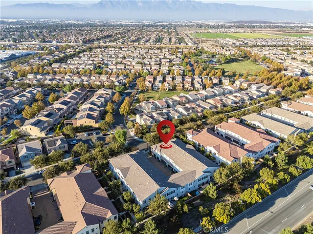 an aerial view of a city with ocean view