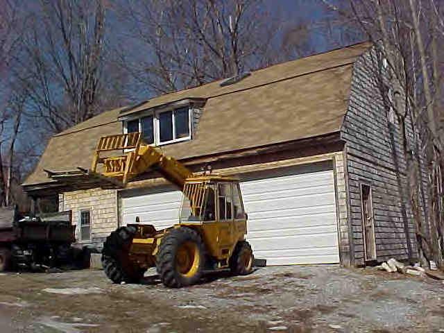 42 Curtin Road Peru, MA 01235 - Photo 6 of 6 a view of a house with a small backyard and parking space
