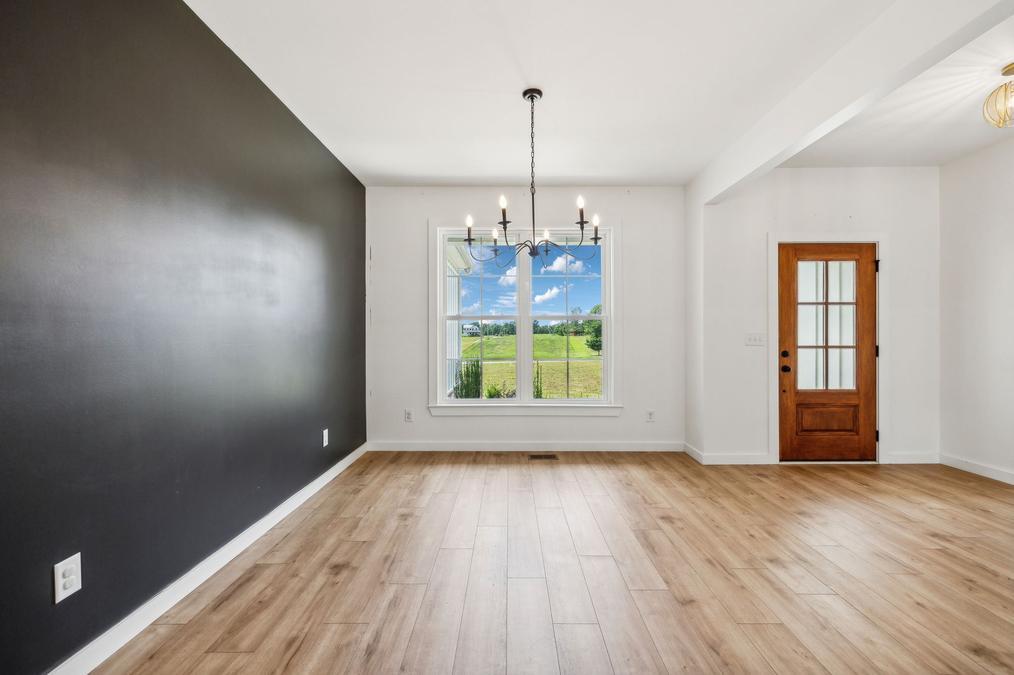 268 Dink Rut Road Portland, TN 37148 - Photo 15 of 62 a view of room window and wooden floor