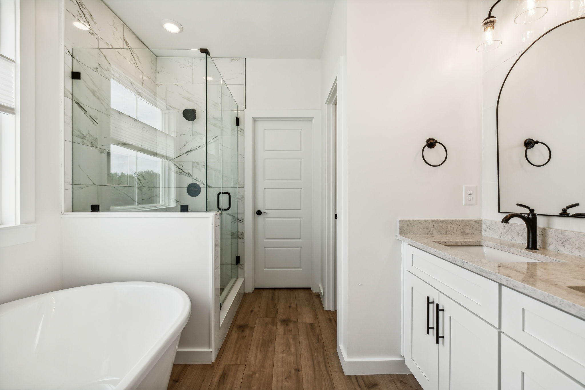 268 Dink Rut Road Portland, TN 37148 - Photo 23 of 62 a bathroom with a granite countertop sink a toilet and shower