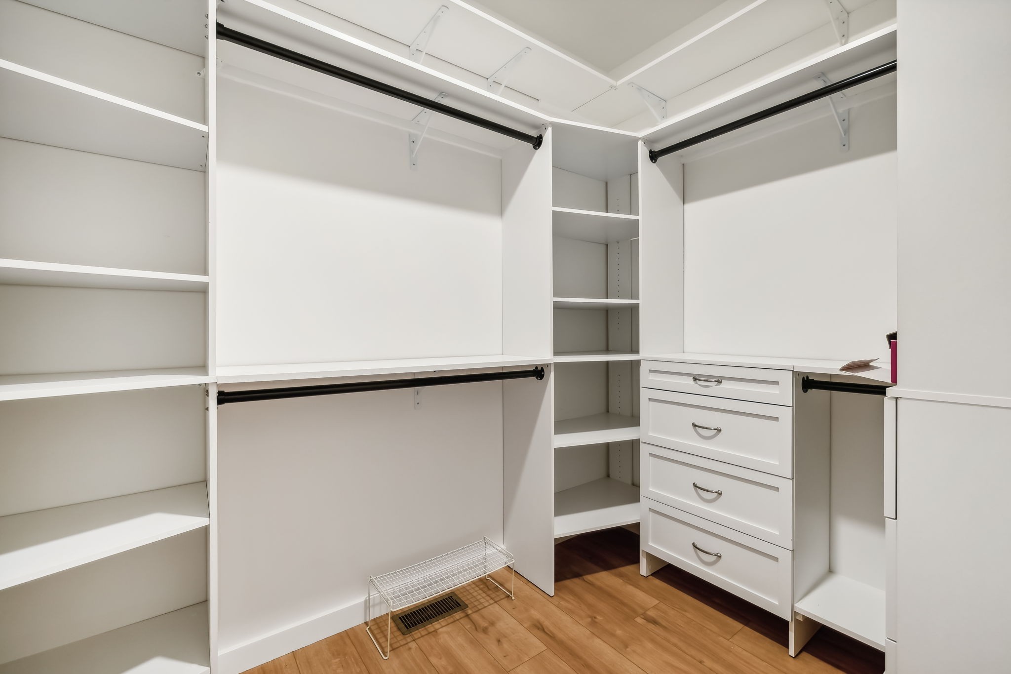 268 Dink Rut Road Portland, TN 37148 - Photo 27 of 62 a view of walk in closet with empty racks
