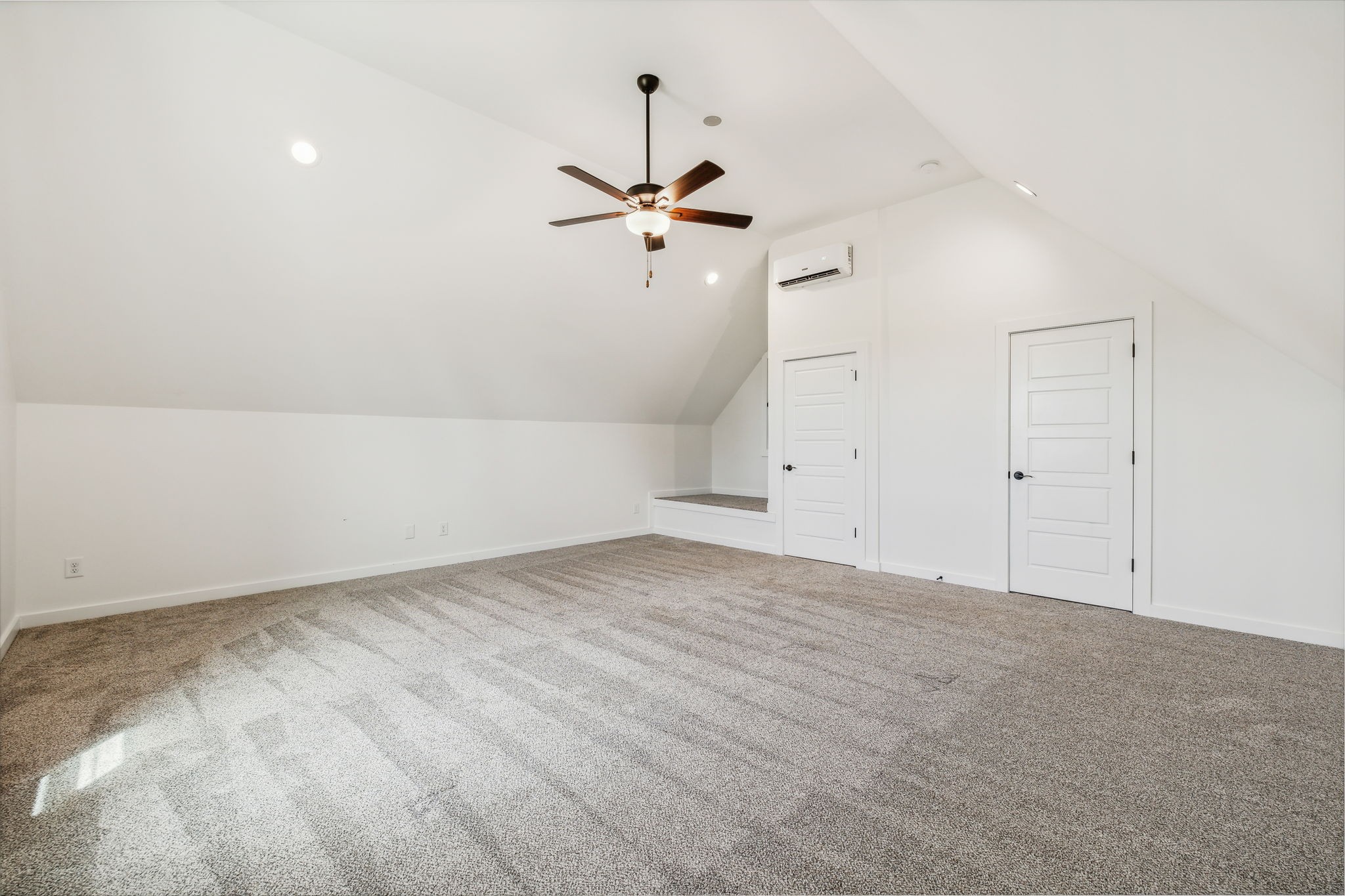 268 Dink Rut Road Portland, TN 37148 - Photo 40 of 62 an empty room with chandelier fan and windows