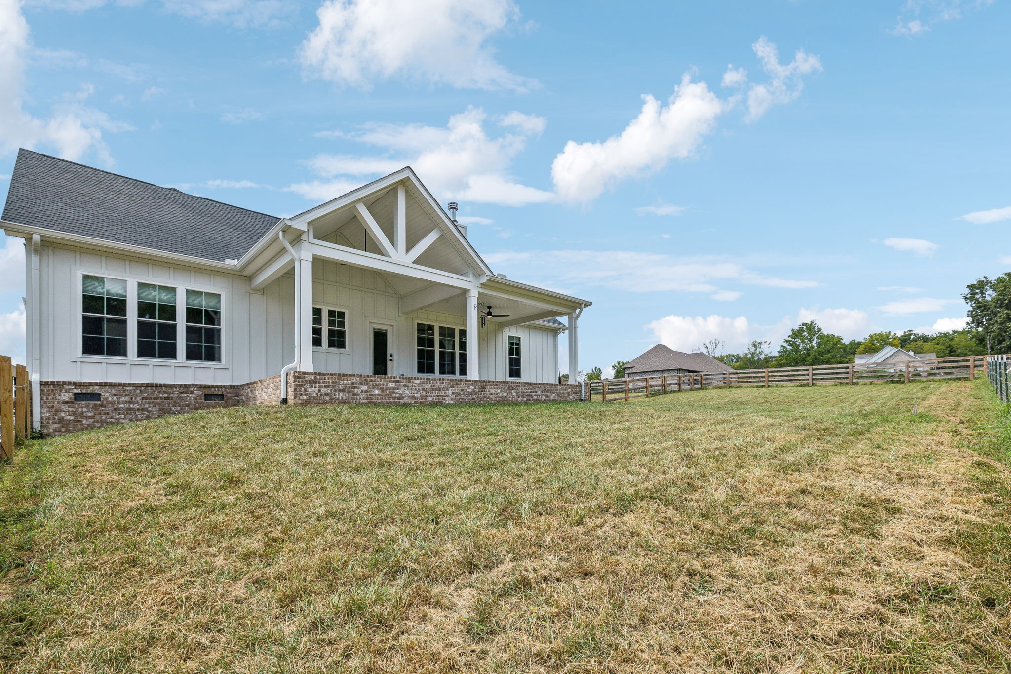 268 Dink Rut Road Portland, TN 37148 - Photo 60 of 62 a house view with swimming pool and wooden fence