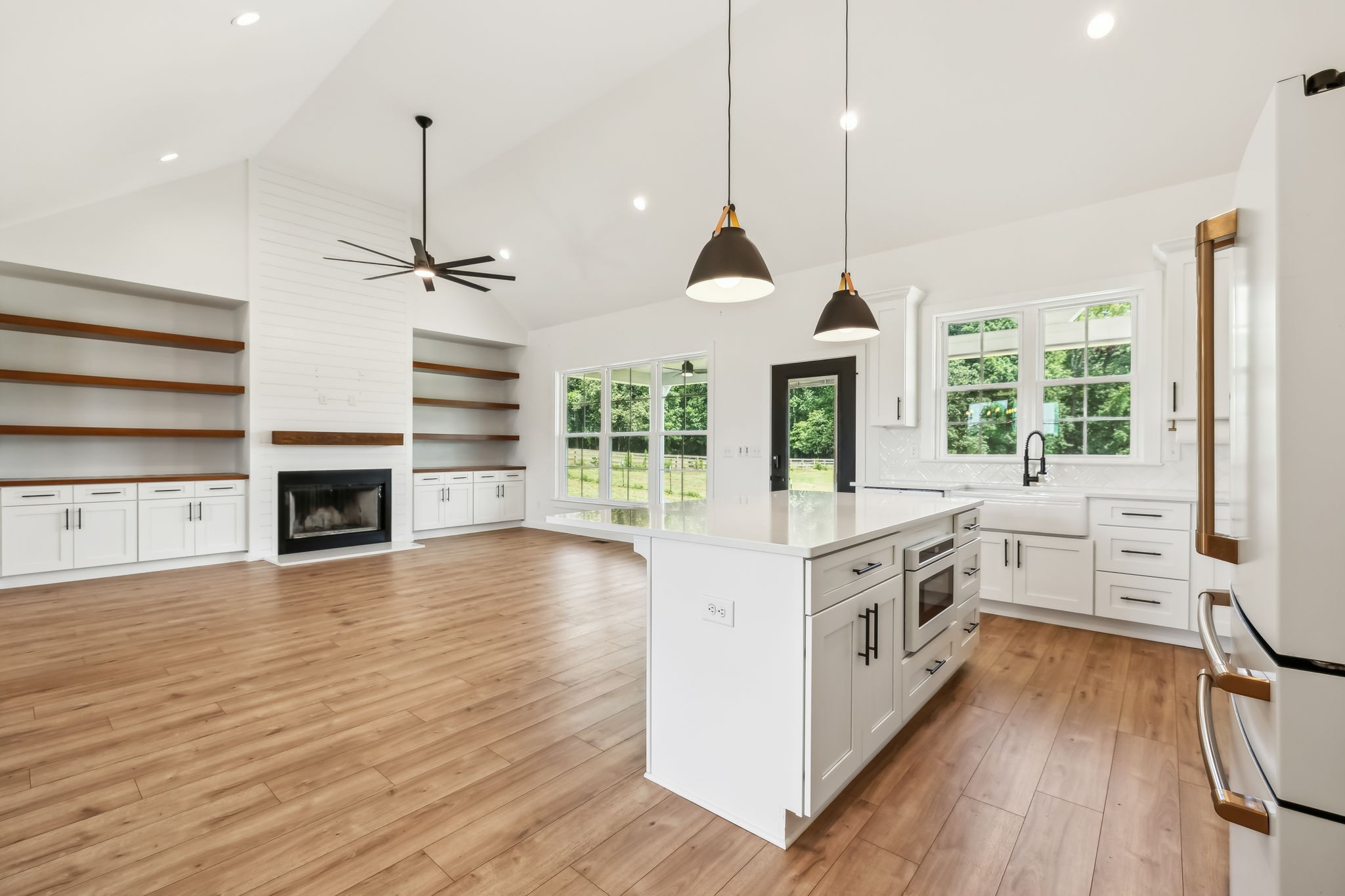 268 Dink Rut Road Portland, TN 37148 - Photo 6 of 62 a kitchen with stainless steel appliances granite countertop a stove and a wooden floors