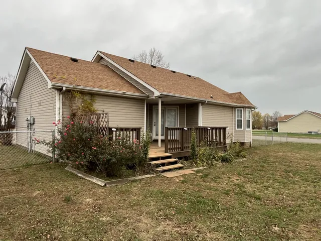 a house view with a garden space