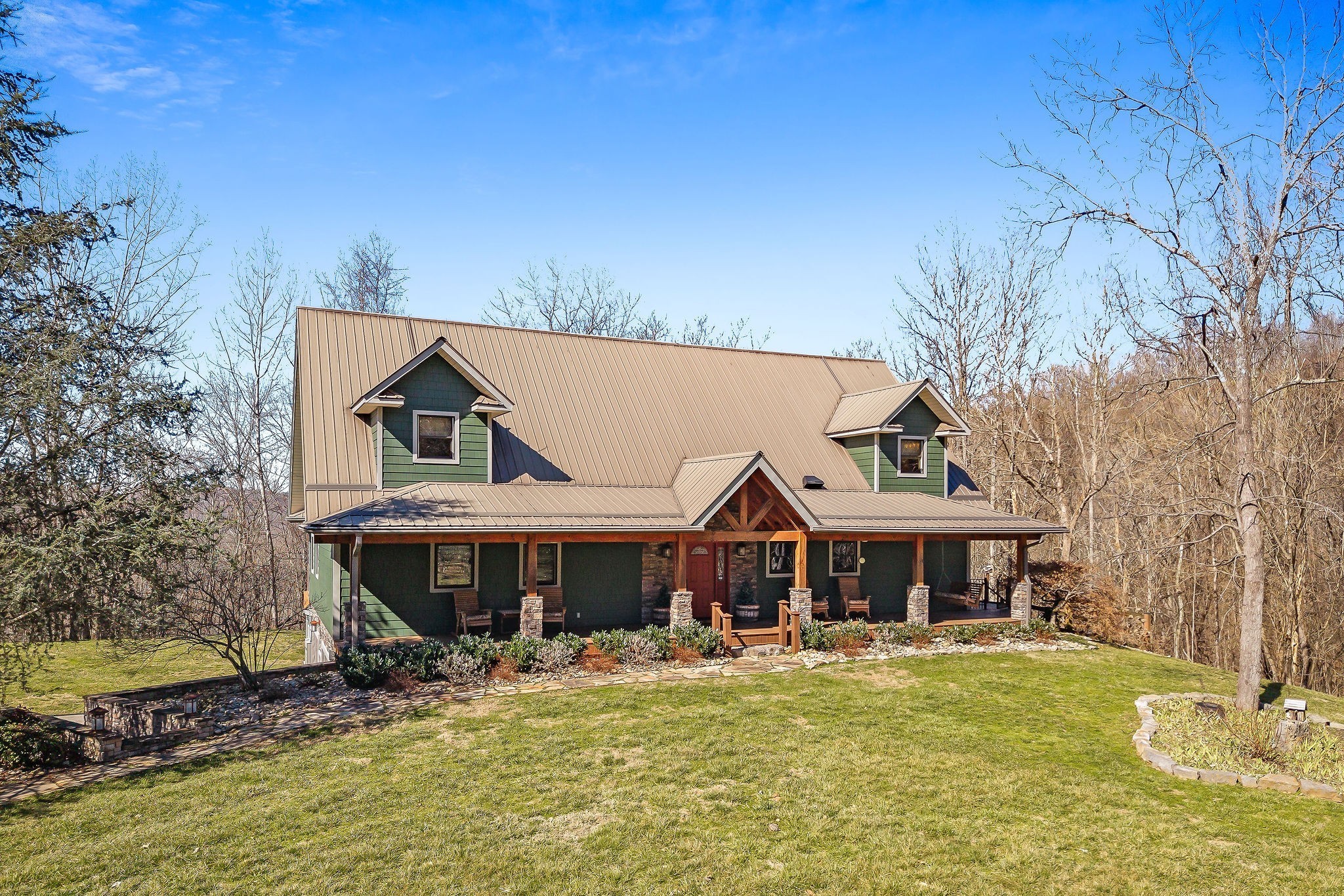 7775 Medley Amonette Road Buffalo Valley, TN 38548 - Photo 6 of 61 a front view of a house with yard swimming pool and outdoor seating
