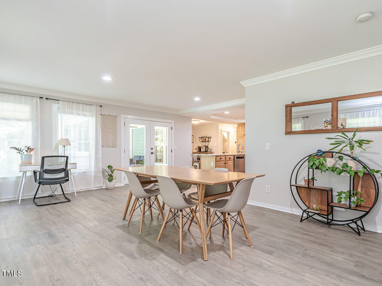 8313 North Creek Run Raleigh, NC 27613 - Photo 21 of 44 Expansive Addition freshly painted with New LVP is perfect for large gatherings with family and friends.