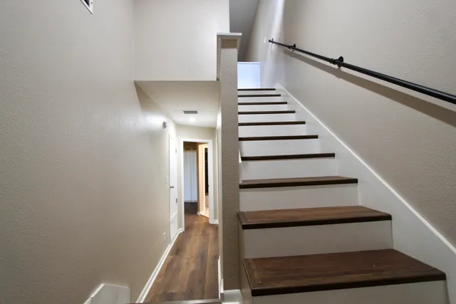 a view of hallway with stairs