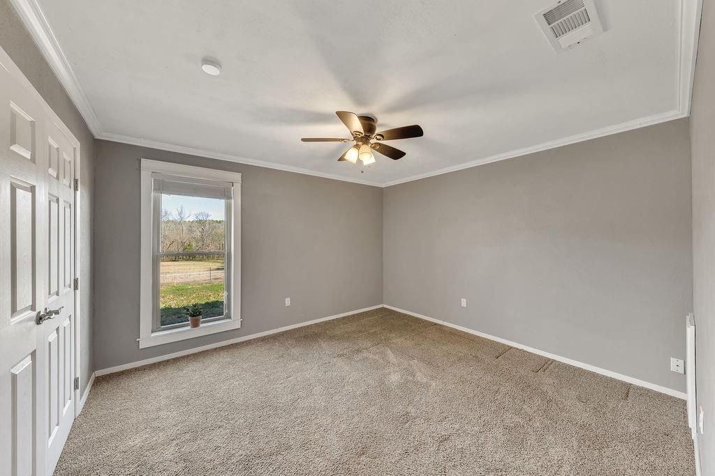 473 County Rd SE 3370 Winnsboro, TX 75494 - Photo 24 of 40 a view of an empty room with a window