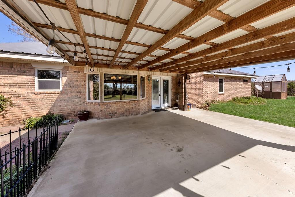 473 County Rd SE 3370 Winnsboro, TX 75494 - Photo 25 of 40 a view of a porch