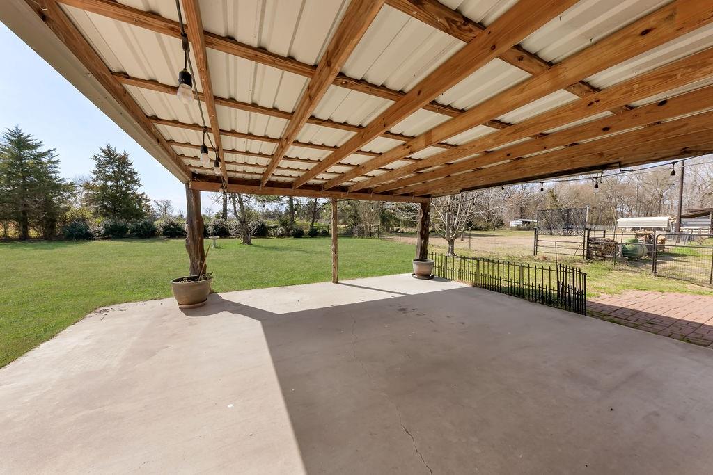 473 County Rd SE 3370 Winnsboro, TX 75494 - Photo 26 of 40 a view of a house with backyard and porch