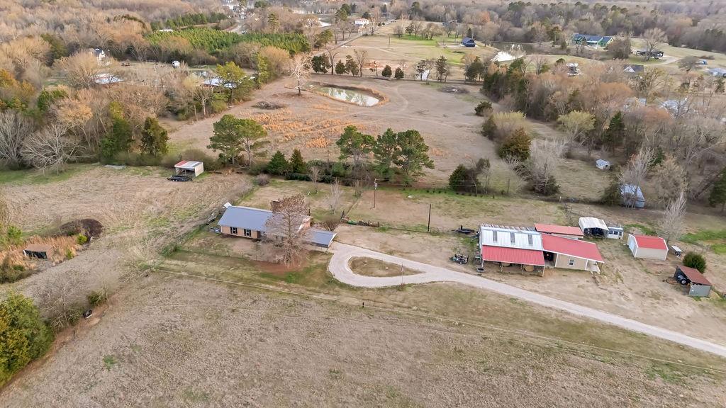 473 County Rd SE 3370 Winnsboro, TX 75494 - Photo 38 of 40 an aerial view of a house with outdoor space
