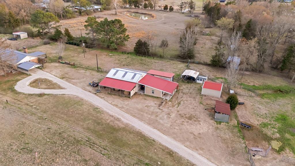473 County Rd SE 3370 Winnsboro, TX 75494 - Photo 39 of 40 an aerial view of a house with outdoor space
