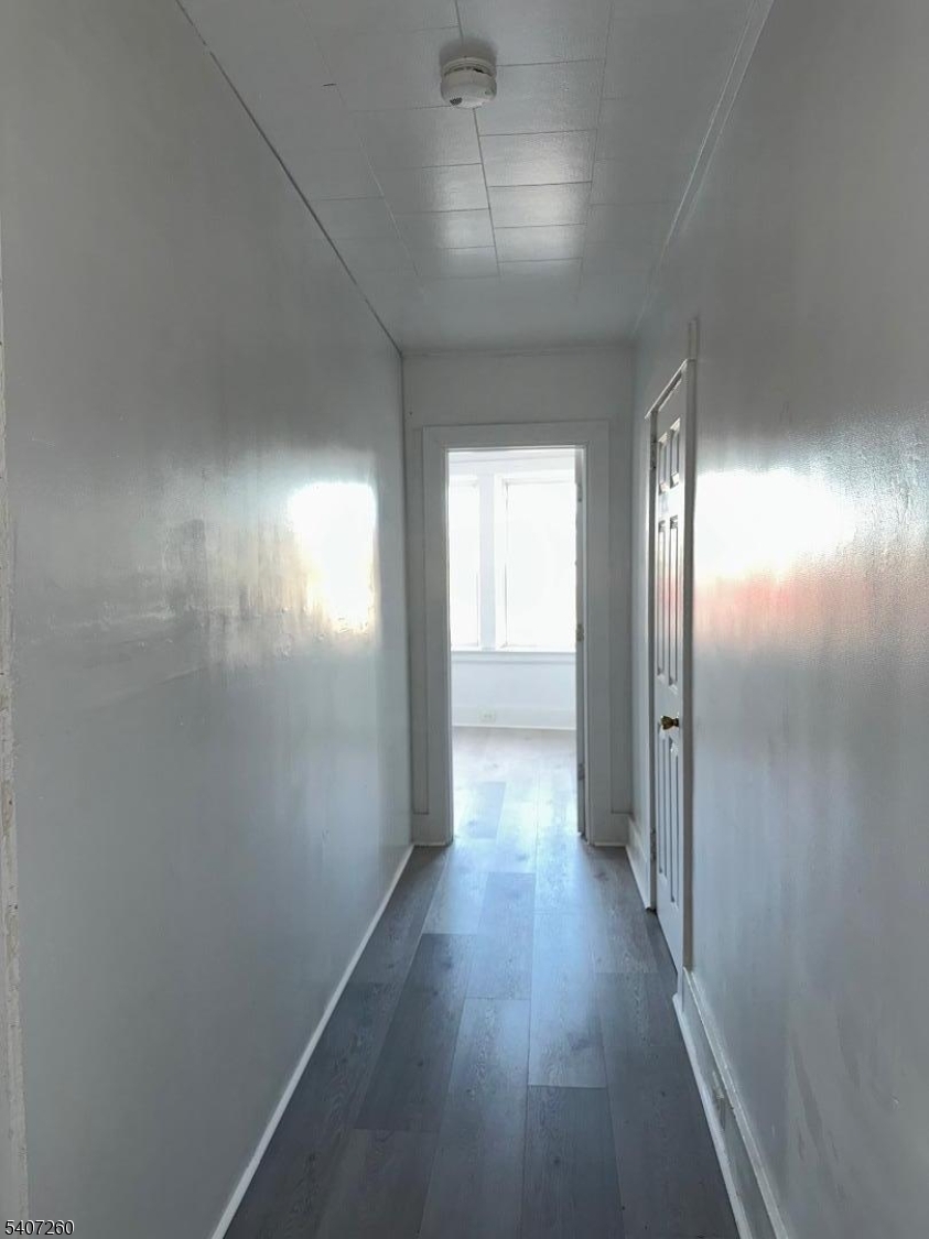 336 Broad Street, Unit 2 Bloomfield, NJ 07003 - Photo 16 of 24 a view of hallway with wooden floor