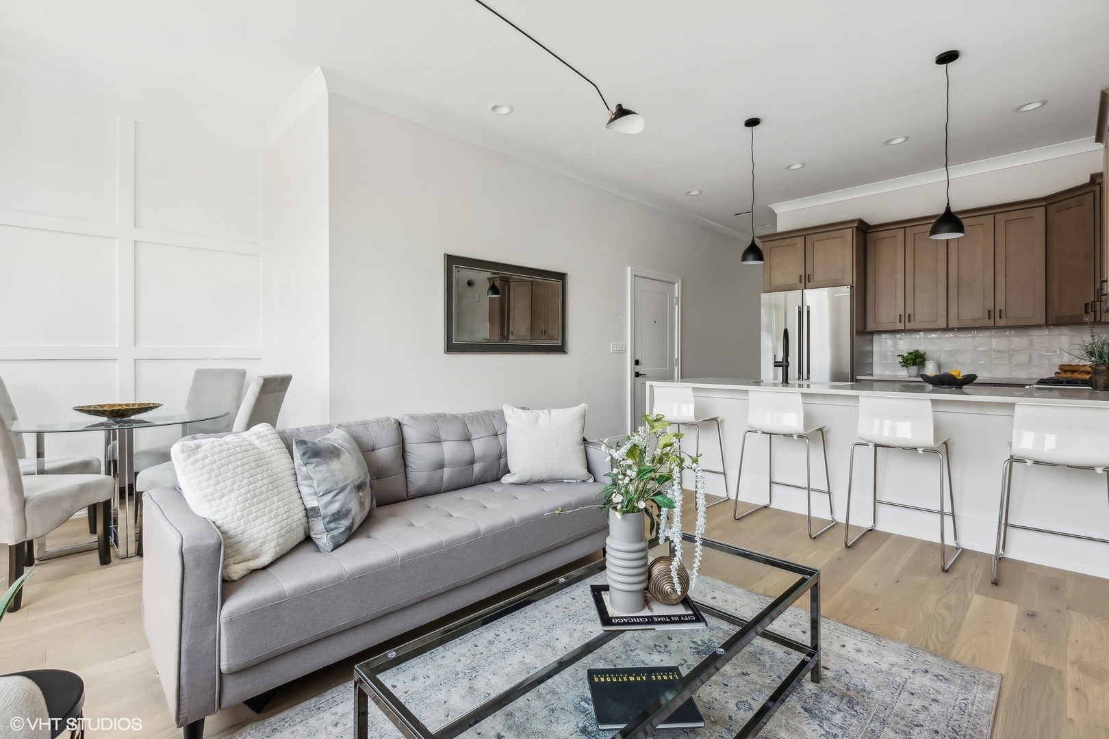 2426 West Augusta Boulevard, Unit 2 Chicago, IL 60622 - Photo 5 of 20 a living room with furniture and kitchen view