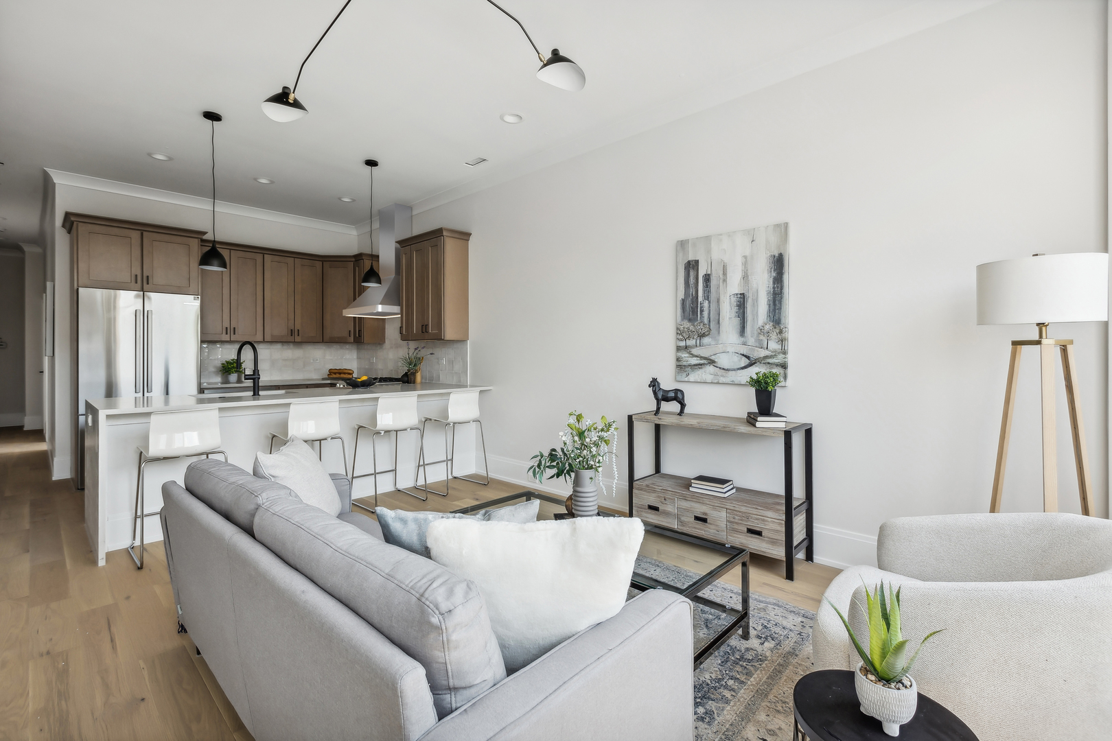 2426 West Augusta Boulevard, Unit 2 Chicago, IL 60622 - Photo 7 of 20 a living room with furniture and a kitchen view