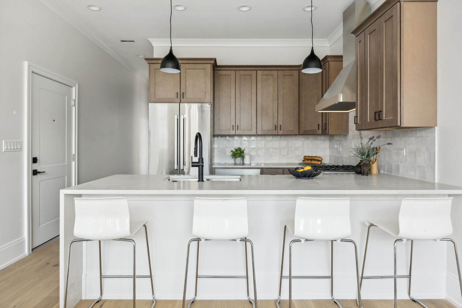 2426 West Augusta Boulevard, Unit 2 Chicago, IL 60622 - Photo 9 of 20 a kitchen with cabinets and a sink