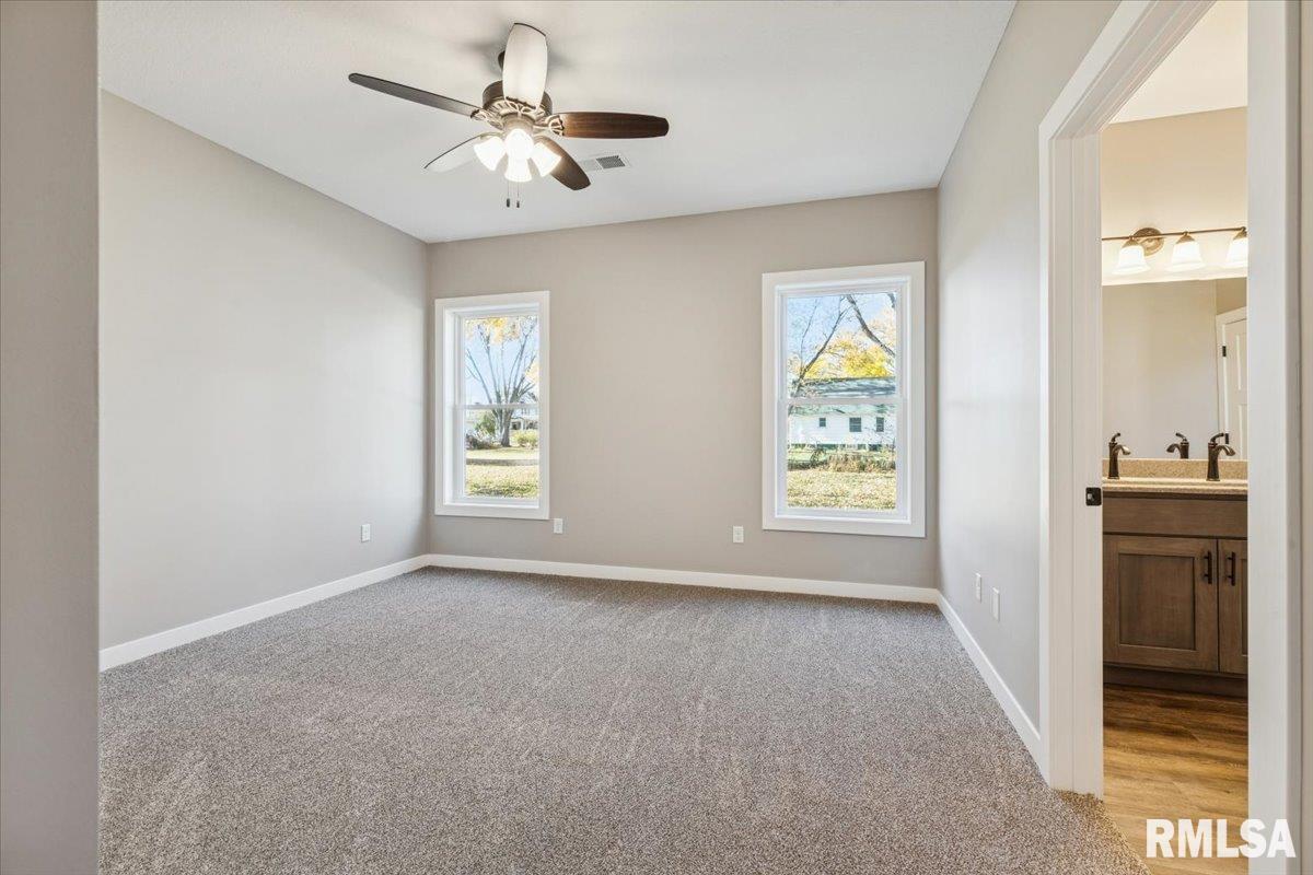1323 5th Avenue De Witt, IA 52742 - Photo 14 of 28 a view of an empty room with a window