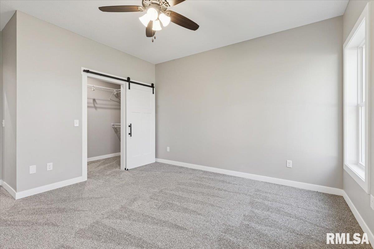 1323 5th Avenue De Witt, IA 52742 - Photo 15 of 28 a view of an empty room and chandelier fan