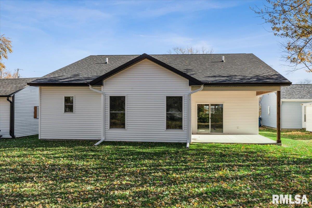 1323 5th Avenue De Witt, IA 52742 - Photo 27 of 28 a front view of a house with garden