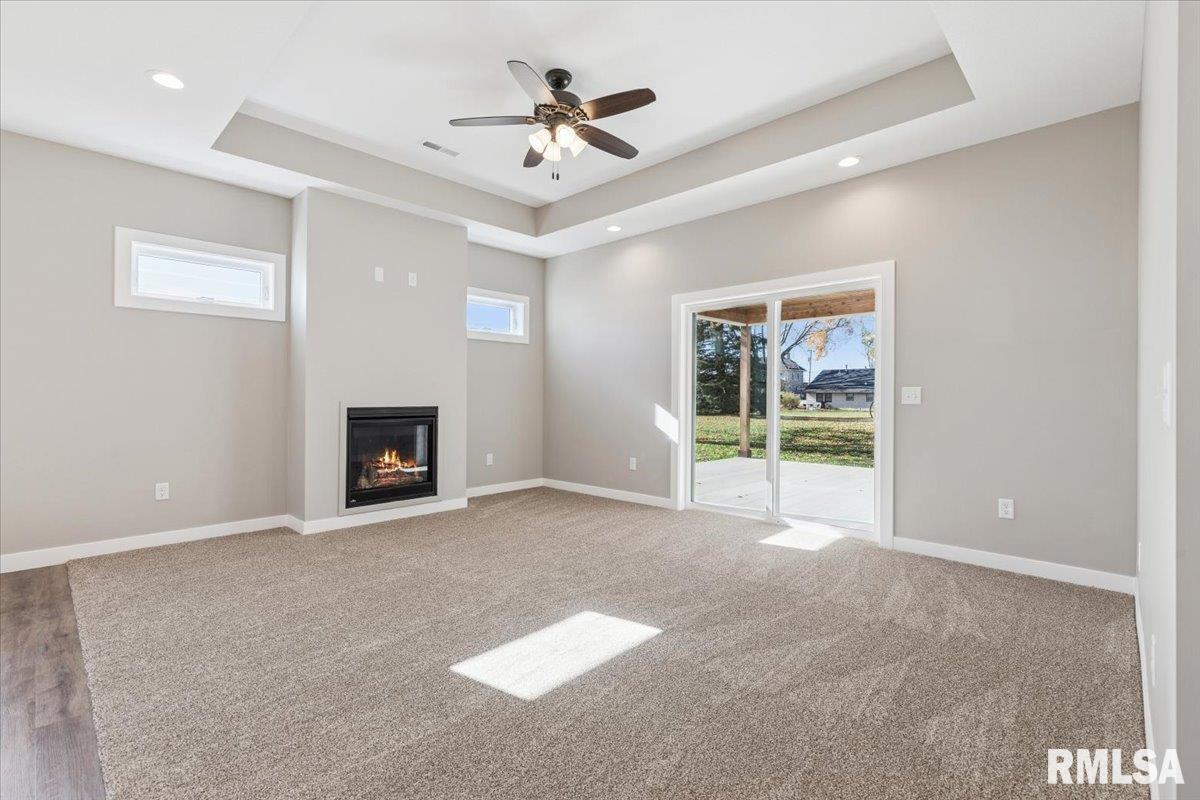 1323 5th Avenue De Witt, IA 52742 - Photo 3 of 28 a view of an empty room with a fireplace