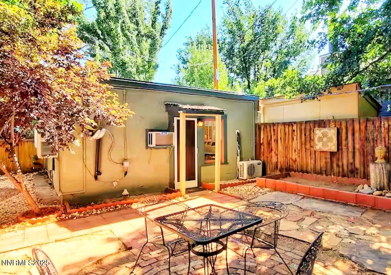 611 Nixon Avenue Reno, NV 89509 - Photo 29 of 43 a backyard of a house with table and chairs