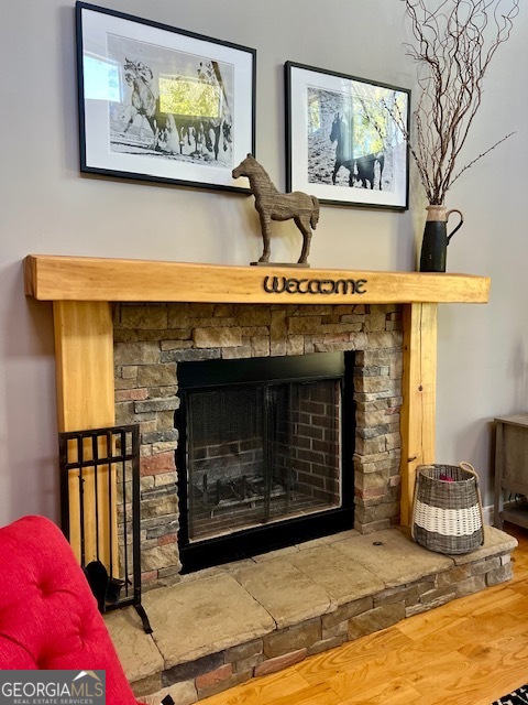 135 Horseshoe Trail Commerce, GA 30529 - Photo 13 of 25 a living room with furniture and a fireplace