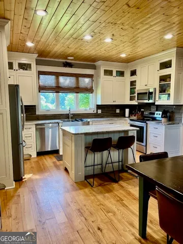a front view of a house with garage