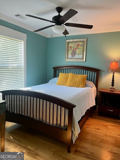 135 Horseshoe Trail Commerce, GA 30529 - Photo 21 of 25 a bed sitting in a bedroom next to a window