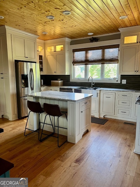 135 Horseshoe Trail Commerce, GA 30529 - Photo 10 of 25 a kitchen with stainless steel appliances granite countertop a stove a sink refrigerator and microwave