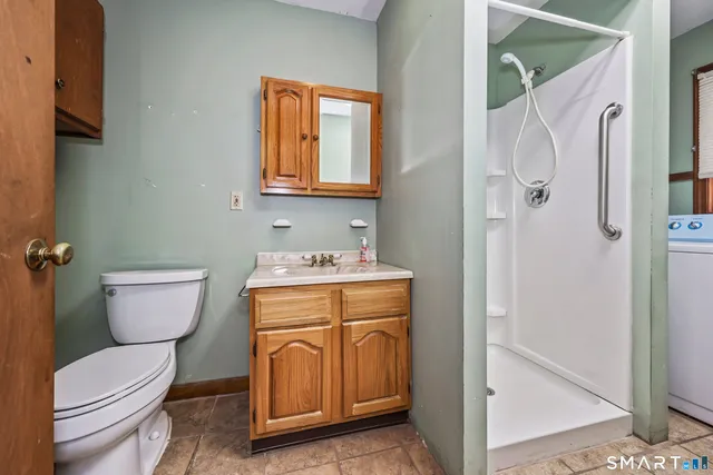 a bathroom with a sink and a toilet