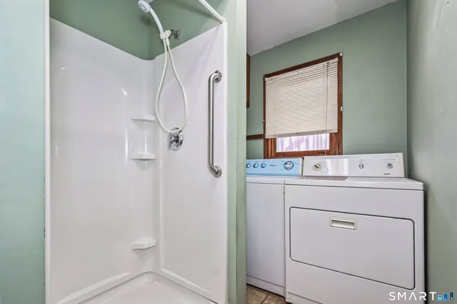 a utility room with dryer and washer