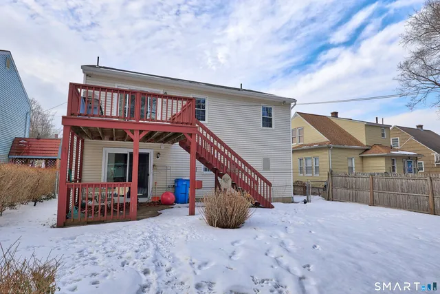 a view of a house with a roof deck