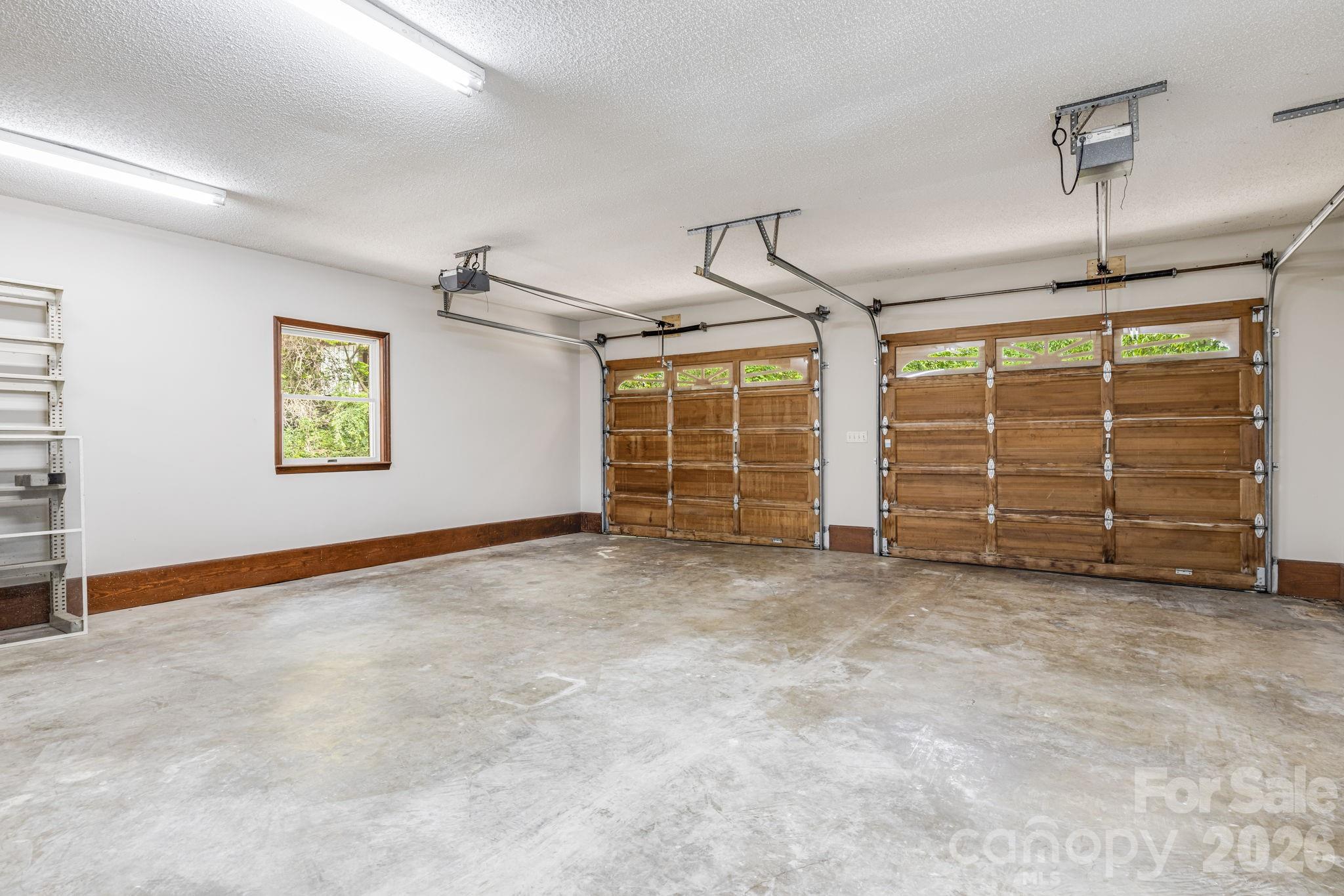 35 Byrd Road Candler, NC 28715 - Photo 34 of 43 an empty room with furniture and a window