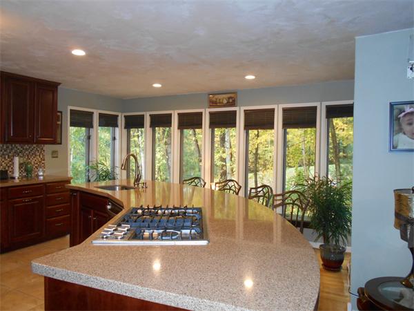 239 Monson Turnpike Road Ware, MA 01082 - Photo 12 of 30 a view of a kitchen with kitchen island a large window in it