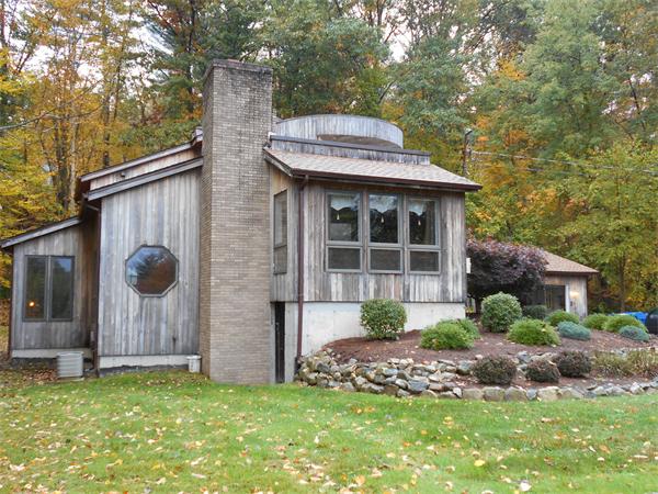 239 Monson Turnpike Road Ware, MA 01082 - Photo 2 of 30 a front view of a house with garden