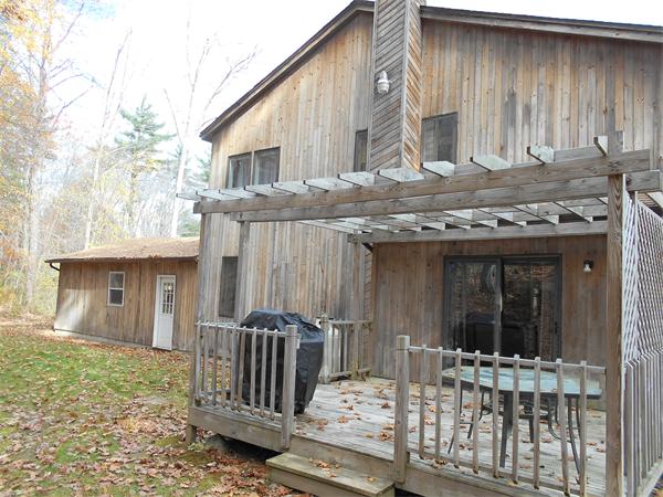 239 Monson Turnpike Road Ware, MA 01082 - Photo 29 of 30 a view of a house with backyard and porch
