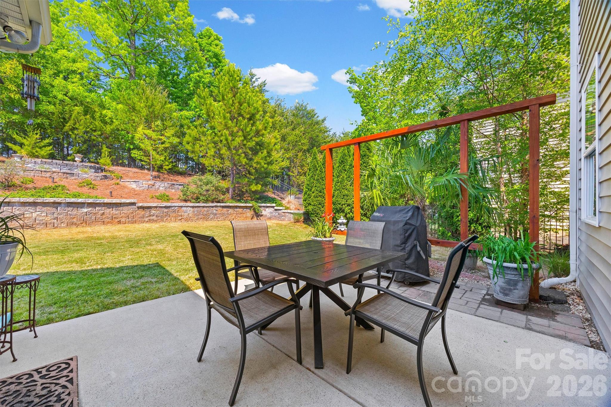 299 Annatto Way Tega Cay, SC 29708 - Photo 42 of 46 a view of an outdoor space with furniture and garden
