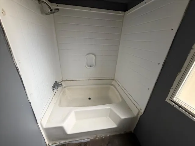 a bathroom with a bathtub
