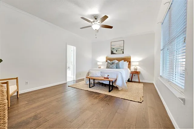 a bed room with a bed and a window