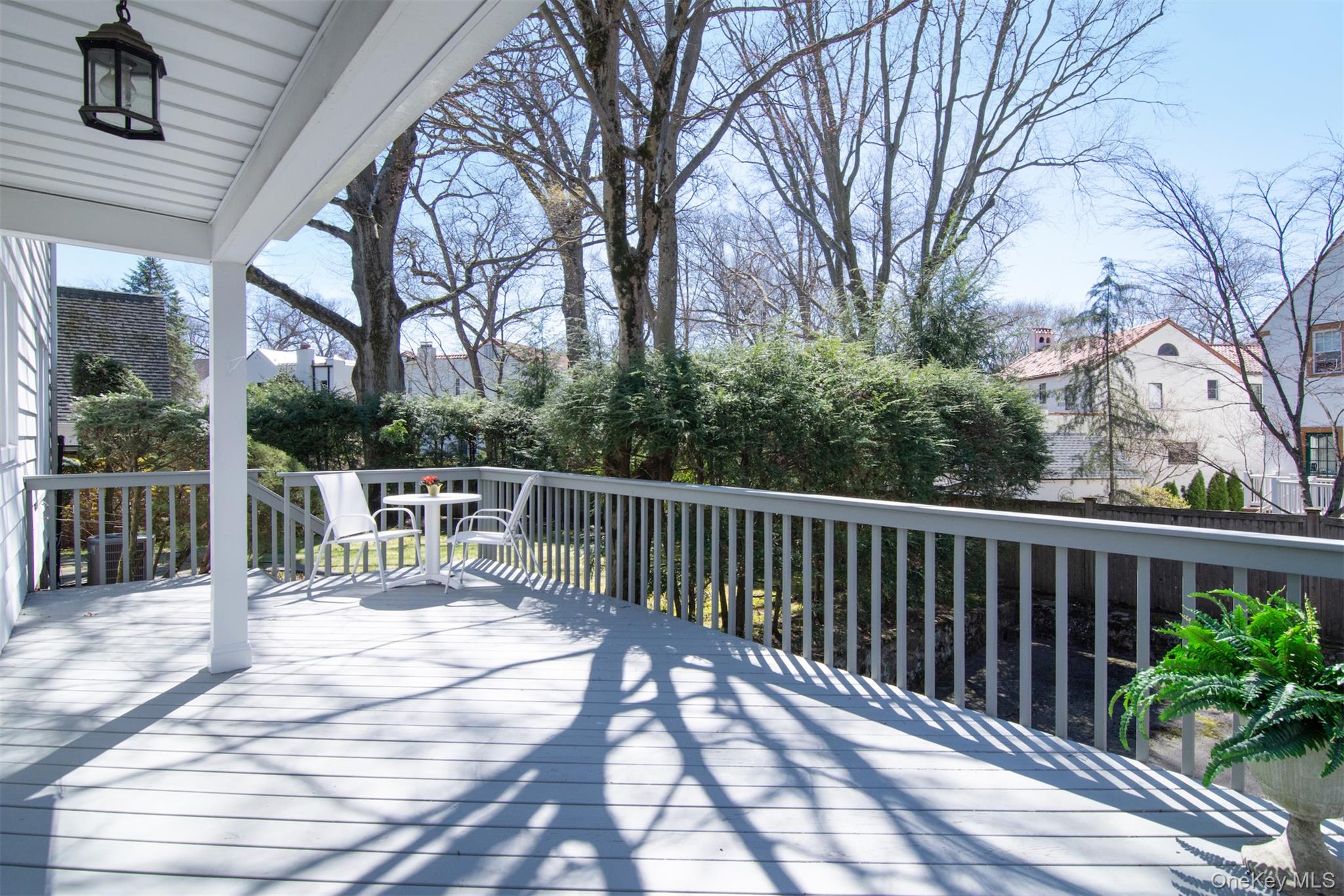 22 Burkewood Road Mount Vernon, NY 10552 - Photo 12 of 27 a view of roof deck with chairs and wooden fence