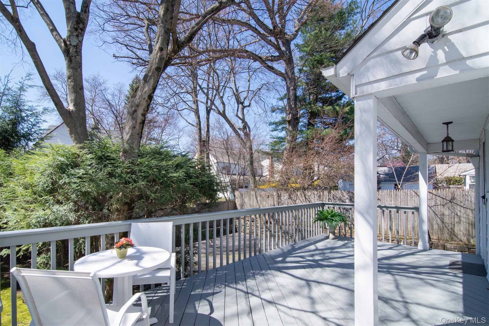 22 Burkewood Road Mount Vernon, NY 10552 - Photo 13 of 27 a balcony with wooden floor and outdoor seating