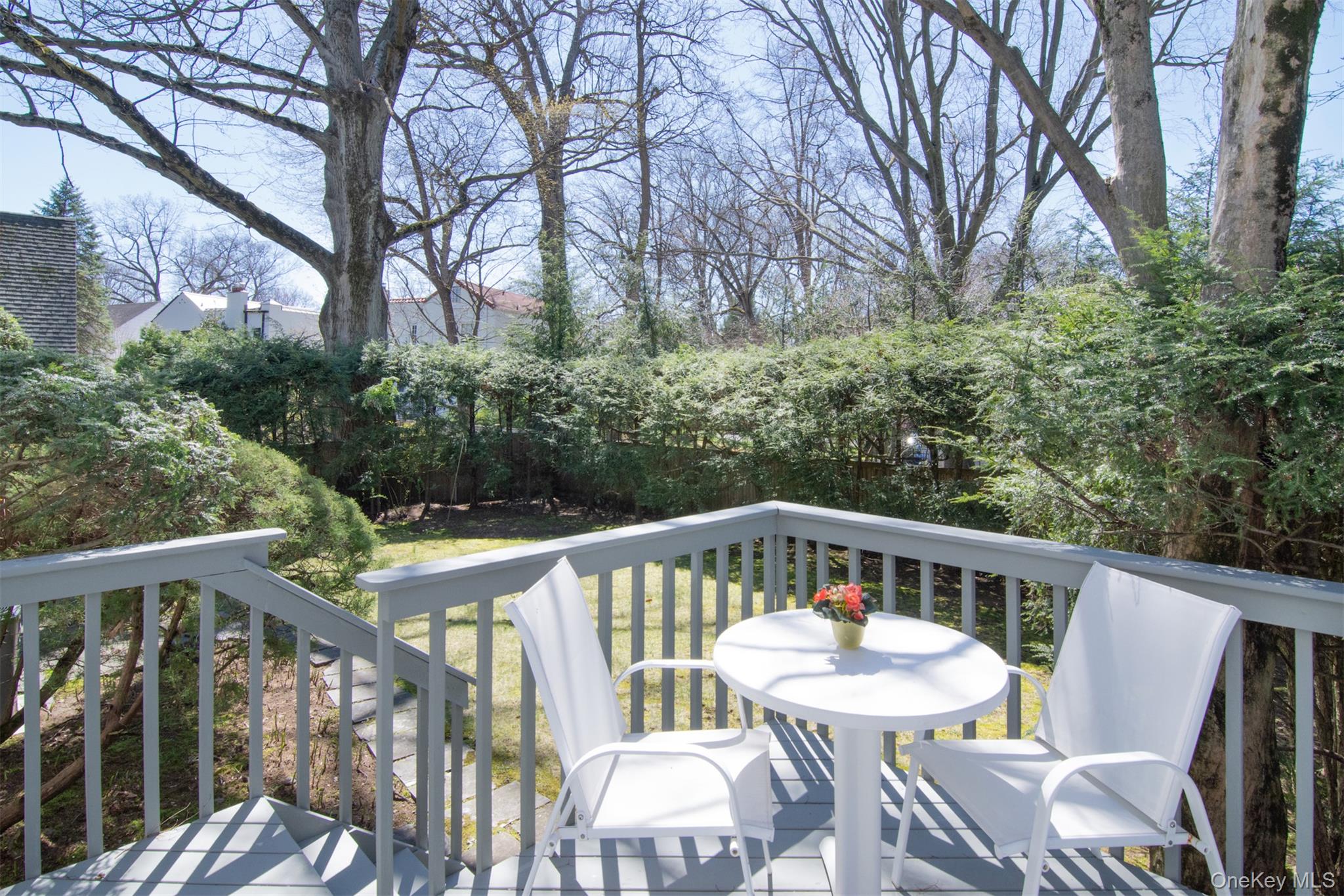 22 Burkewood Road Mount Vernon, NY 10552 - Photo 14 of 27 a view of a chair and table on the deck