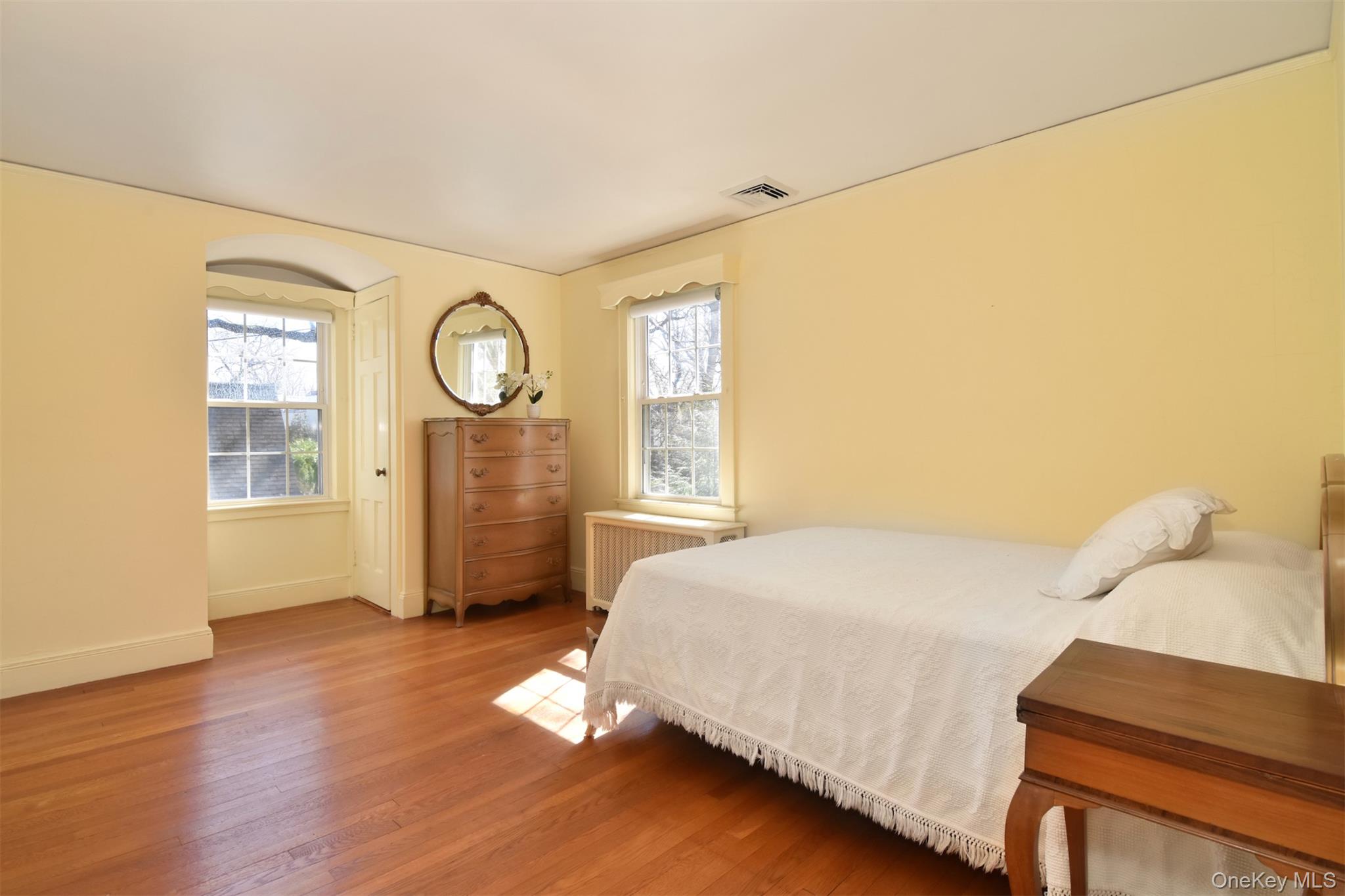 22 Burkewood Road Mount Vernon, NY 10552 - Photo 21 of 27 a bedroom with a bed and a window