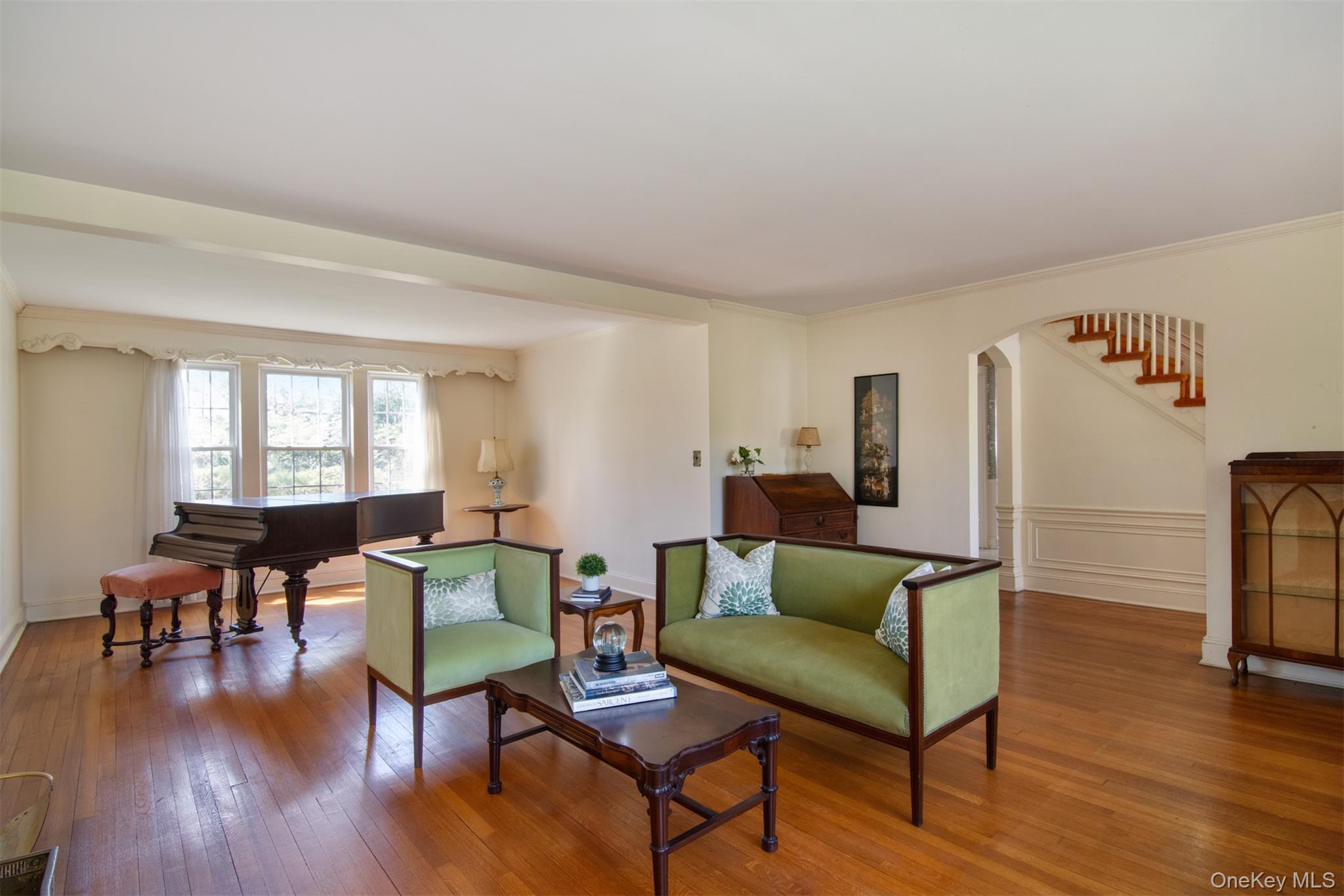 22 Burkewood Road Mount Vernon, NY 10552 - Photo 3 of 27 a living room with furniture and a wooden floor