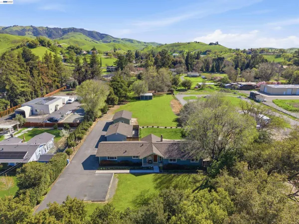 a view of house with outdoor space and street view