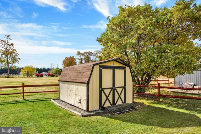 a view of a bench in a garden