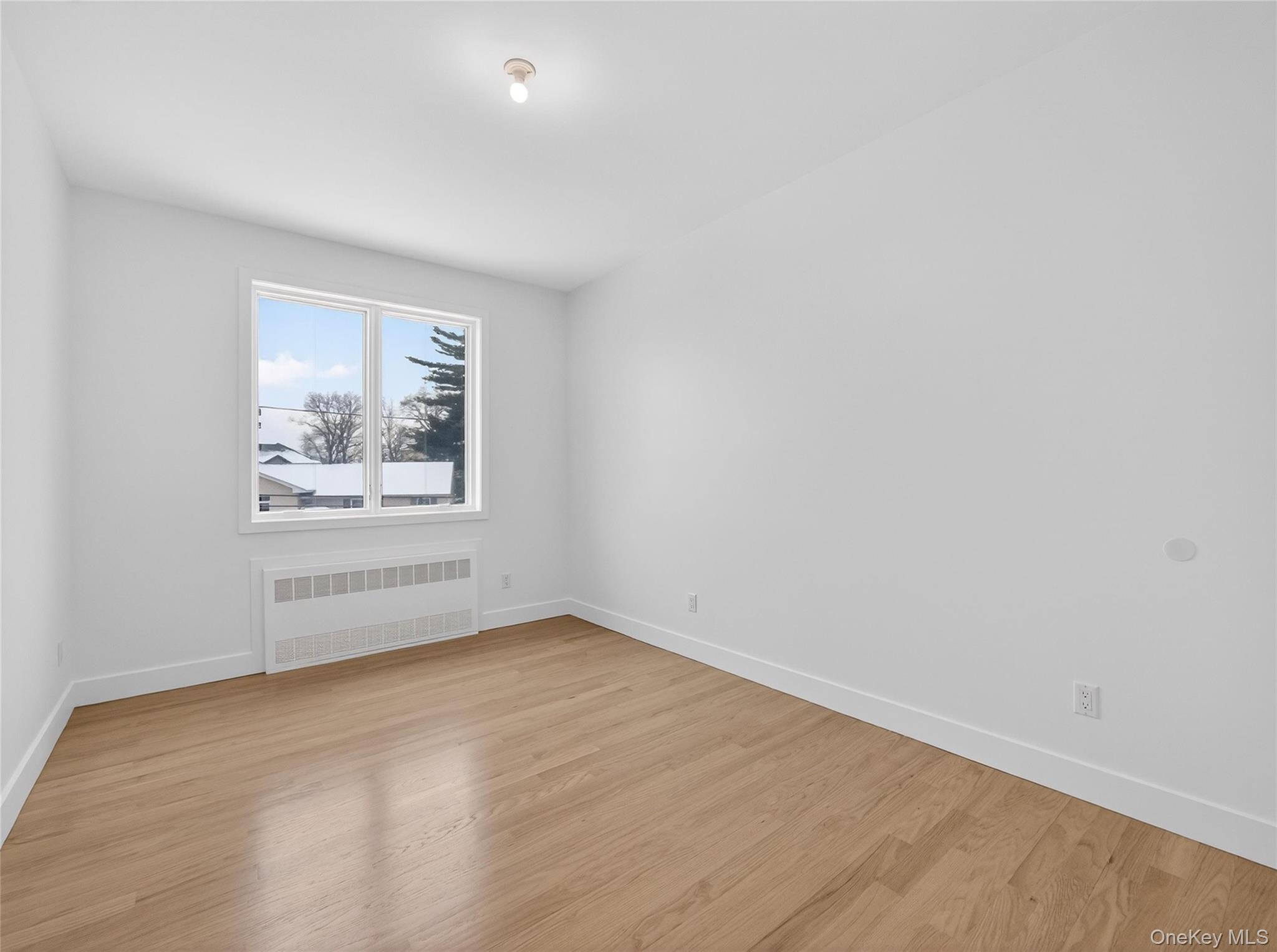 13 Elener Lane, Unit 202 Spring Valley, NY 10977 - Photo 11 of 48 an empty room with windows