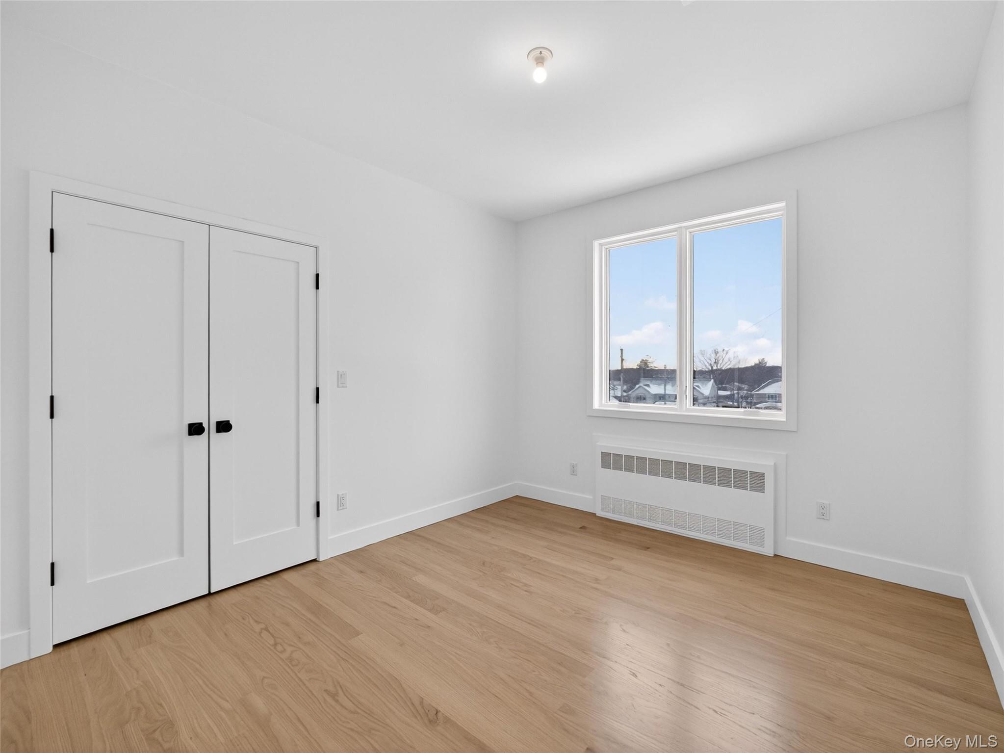 13 Elener Lane, Unit 202 Spring Valley, NY 10977 - Photo 21 of 48 an empty room with windows